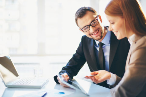 Man and woman discussing business insurance in Liberty Center, OH