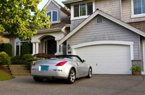 Auto insurance covered car outside an Otsego, OH, home