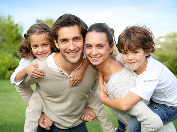 Family Hugging with Insurance in Swanton, OH, Defiance, OH, Sylvania, Toledo, Bryan, Maumee