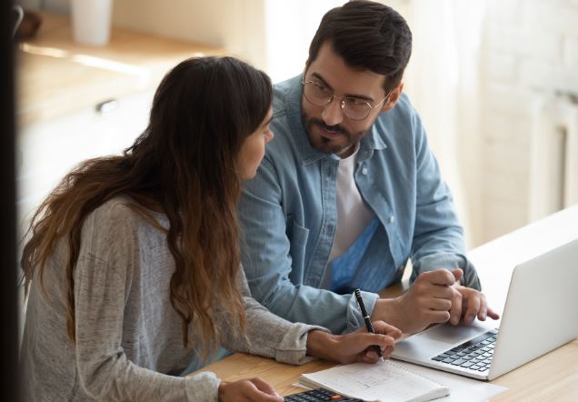 Couple discussing policies from an Insurance Agency in Napoleon, OH