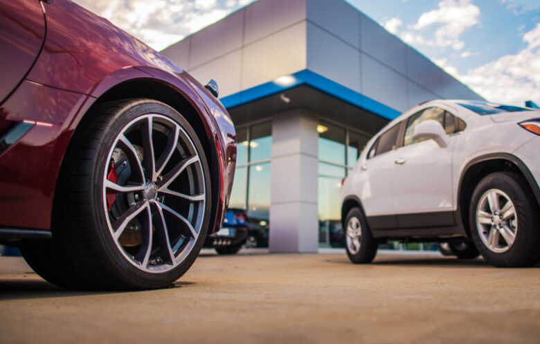 Auto body shop and dealership insurance protecting cars on a lot in Napoleon, OH