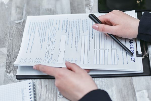 An Independent Insurance Agent holding a policy near Wauseon, Ohio