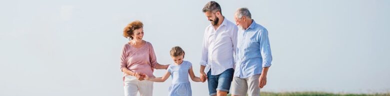 Family Walking on Beach with Life Insurance in Toledo, OH